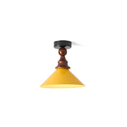 Wilken Ceiling Lamp in yellow and walnut against a neutral background.
