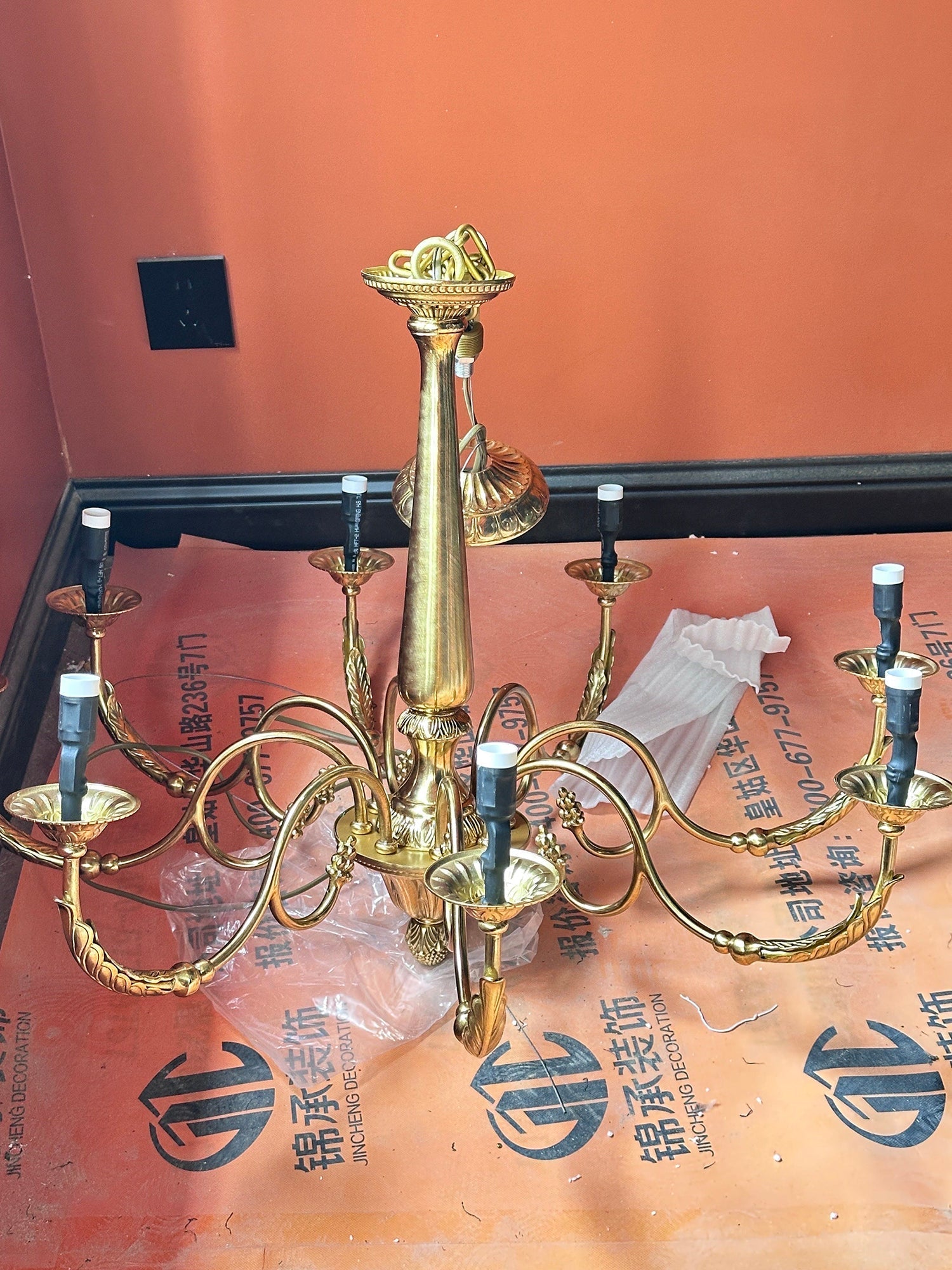 Winchester Brass Chandelier with a classic candle-effect design.