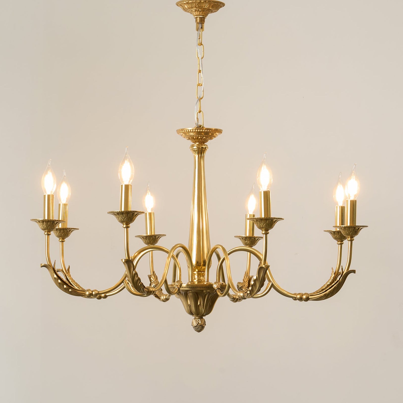 Lifestyle image of the chandelier in a high-ceiling foyer.
