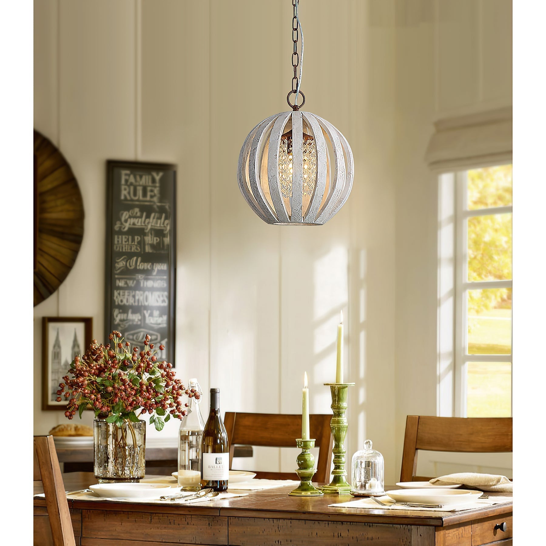 The lamp hanging over a dining table.