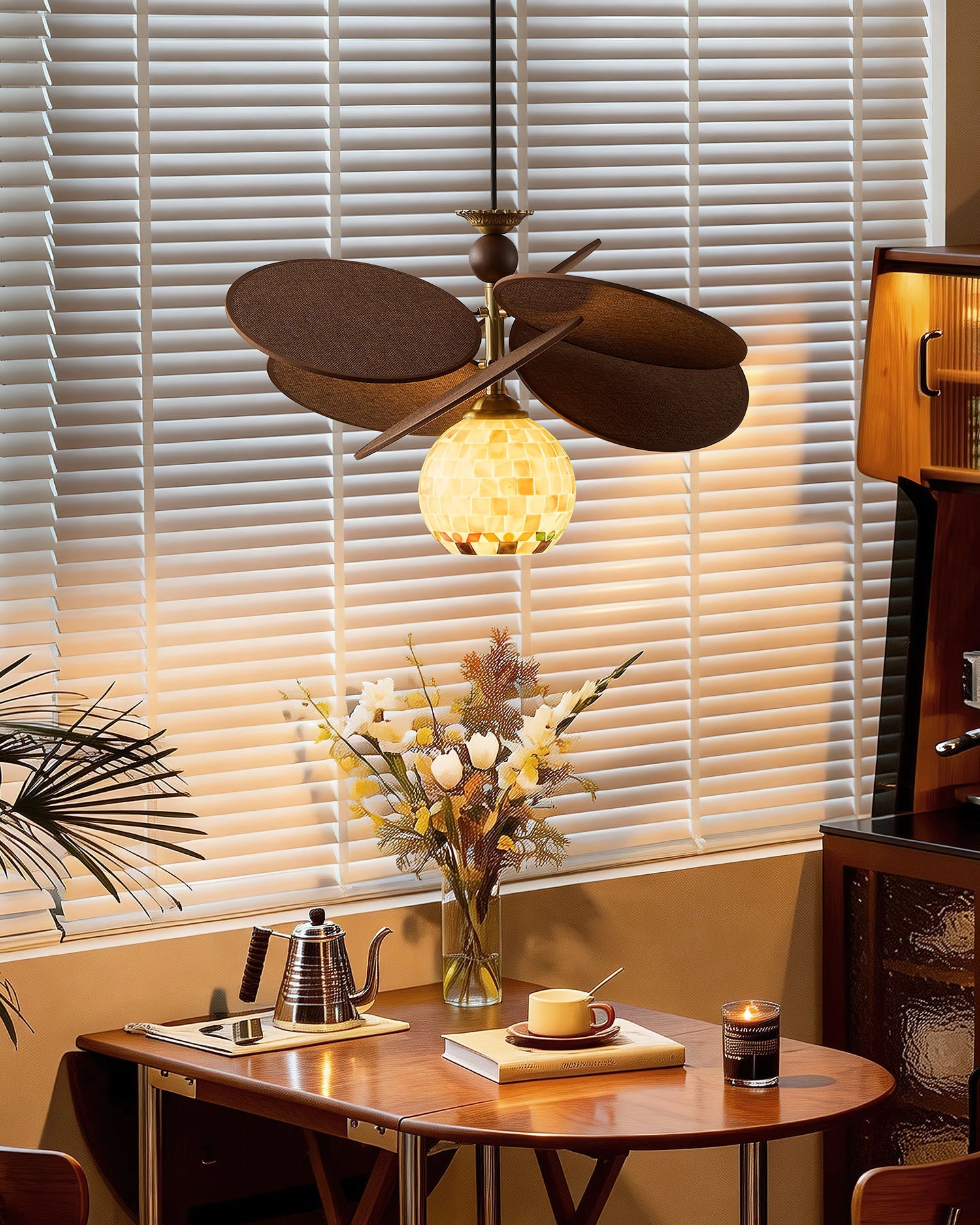 The chandelier shown lit, casting a warm ambient glow.