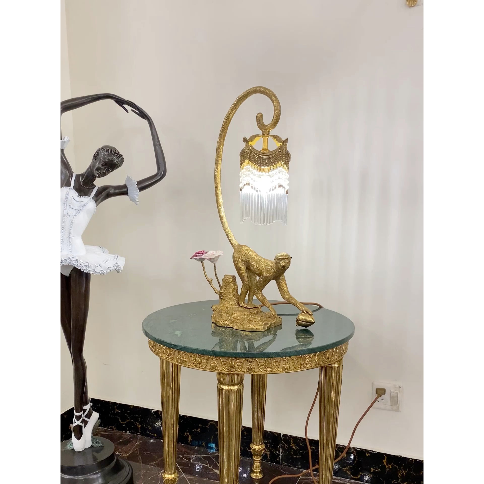 Zira Table Lamp in a living room setting, adding a touch of luxury.