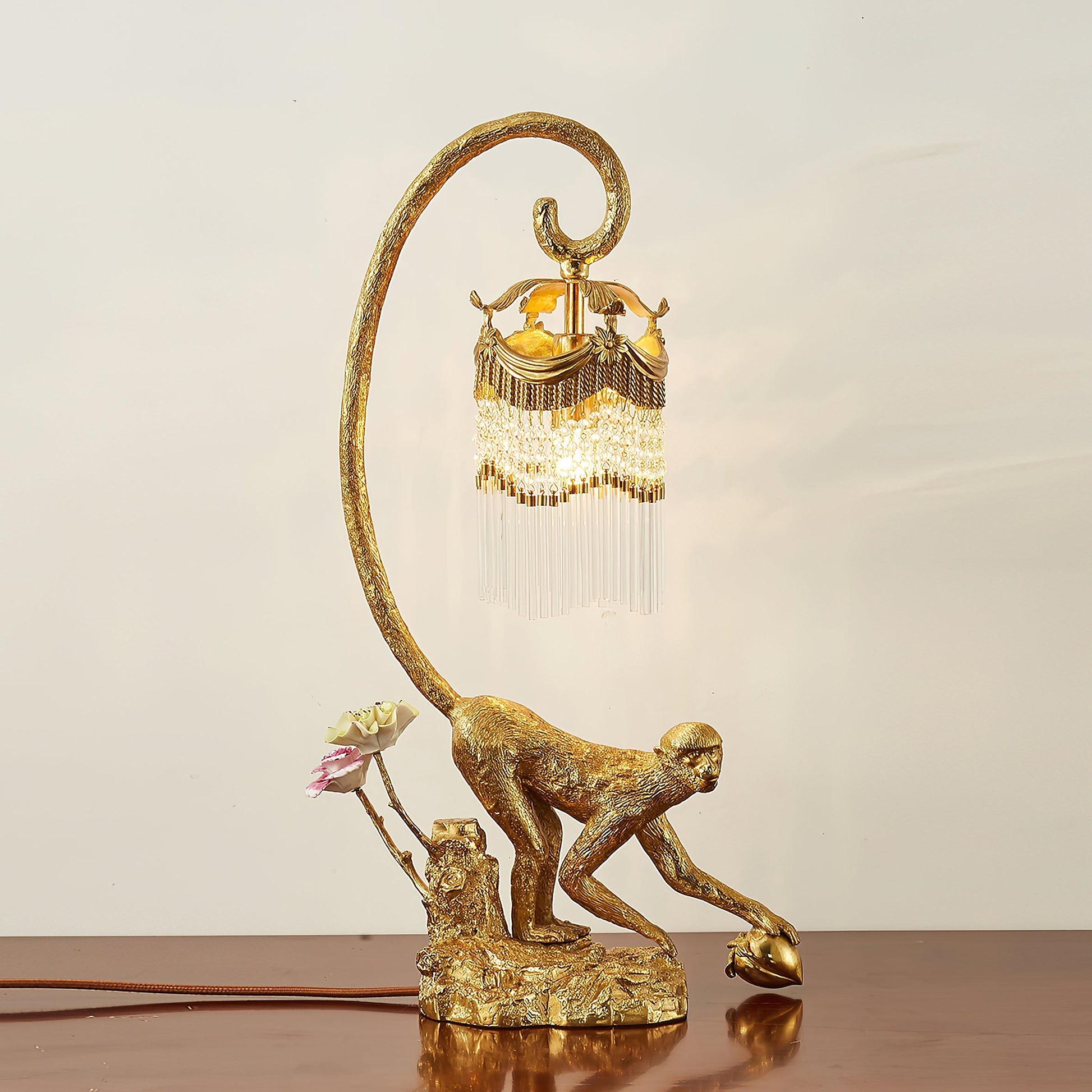 The lamp illuminated, showcasing the light refraction through the crystals.