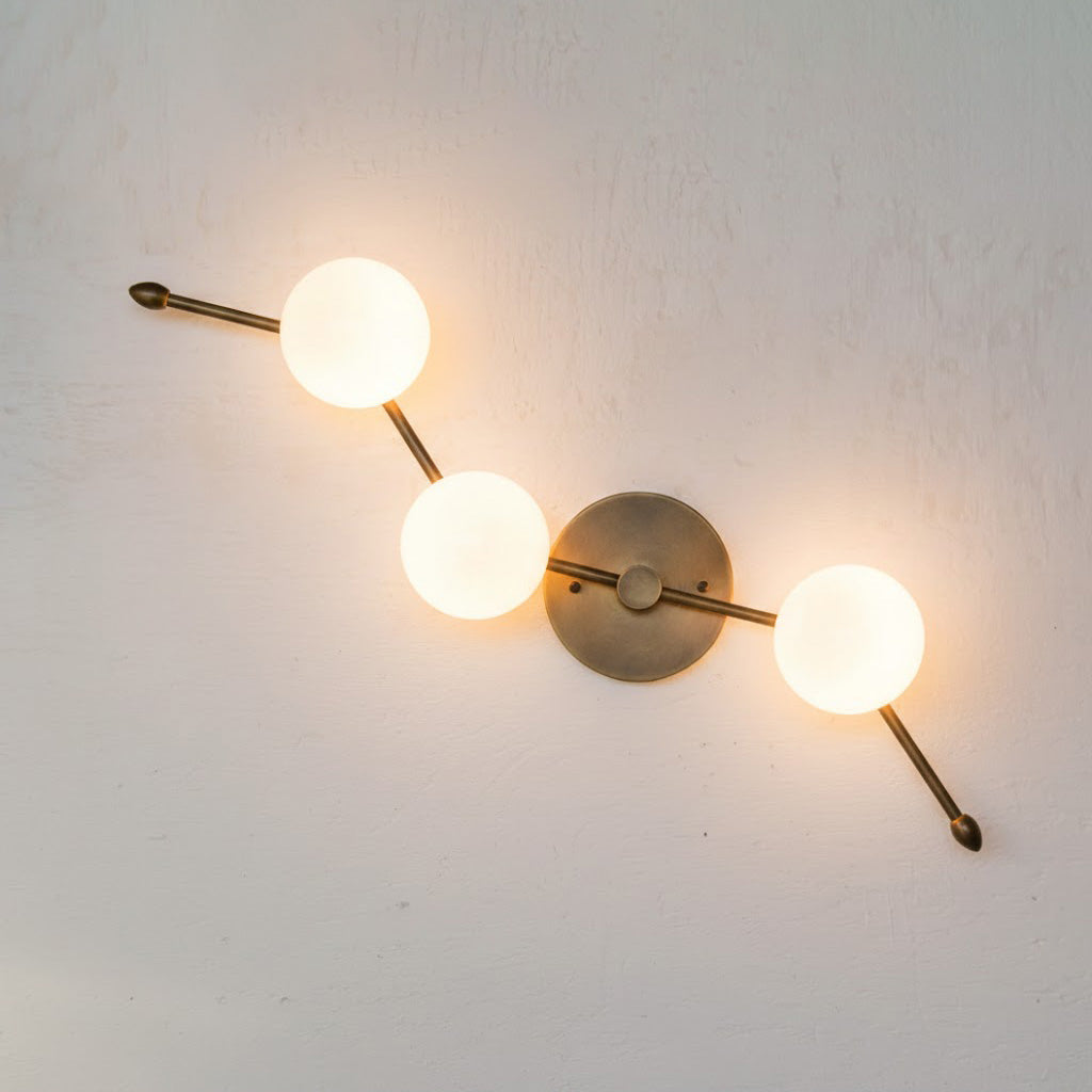 Close-up of the G9 bulb socket area on the Zodiac Wall Lamp.