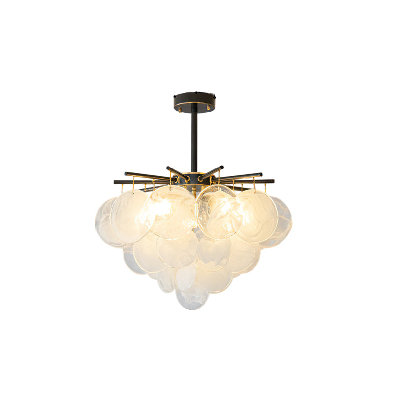Swatch showing the hand-blown glass texture and brushed brass finish.