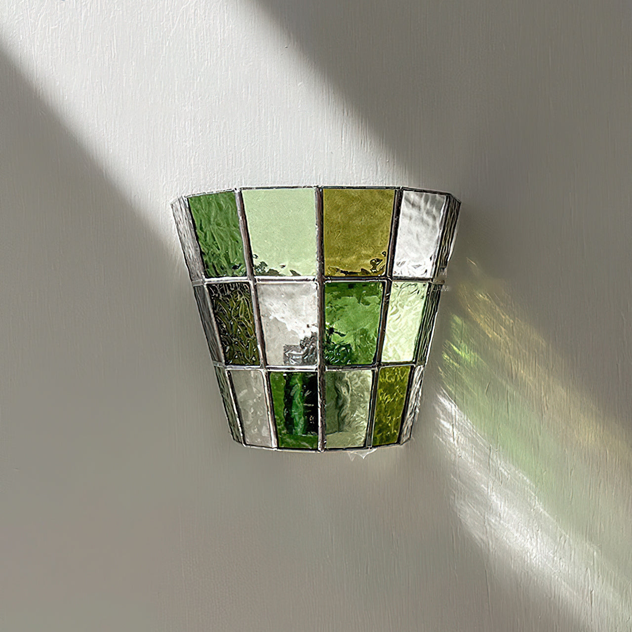 Front view of the Zola Glass Sconce in the amber glass option.