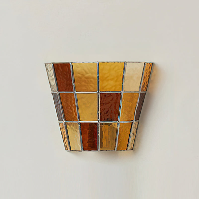 A display showing all four glass color options for the Zola Sconce.