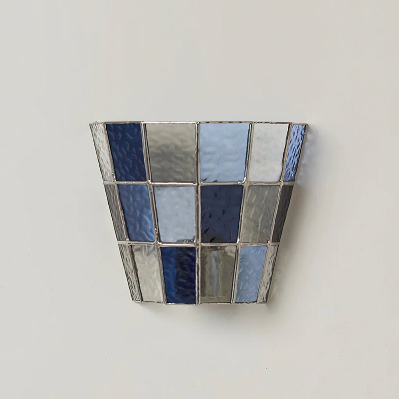 The Zola Glass Sconce unlit, showcasing its architectural form.