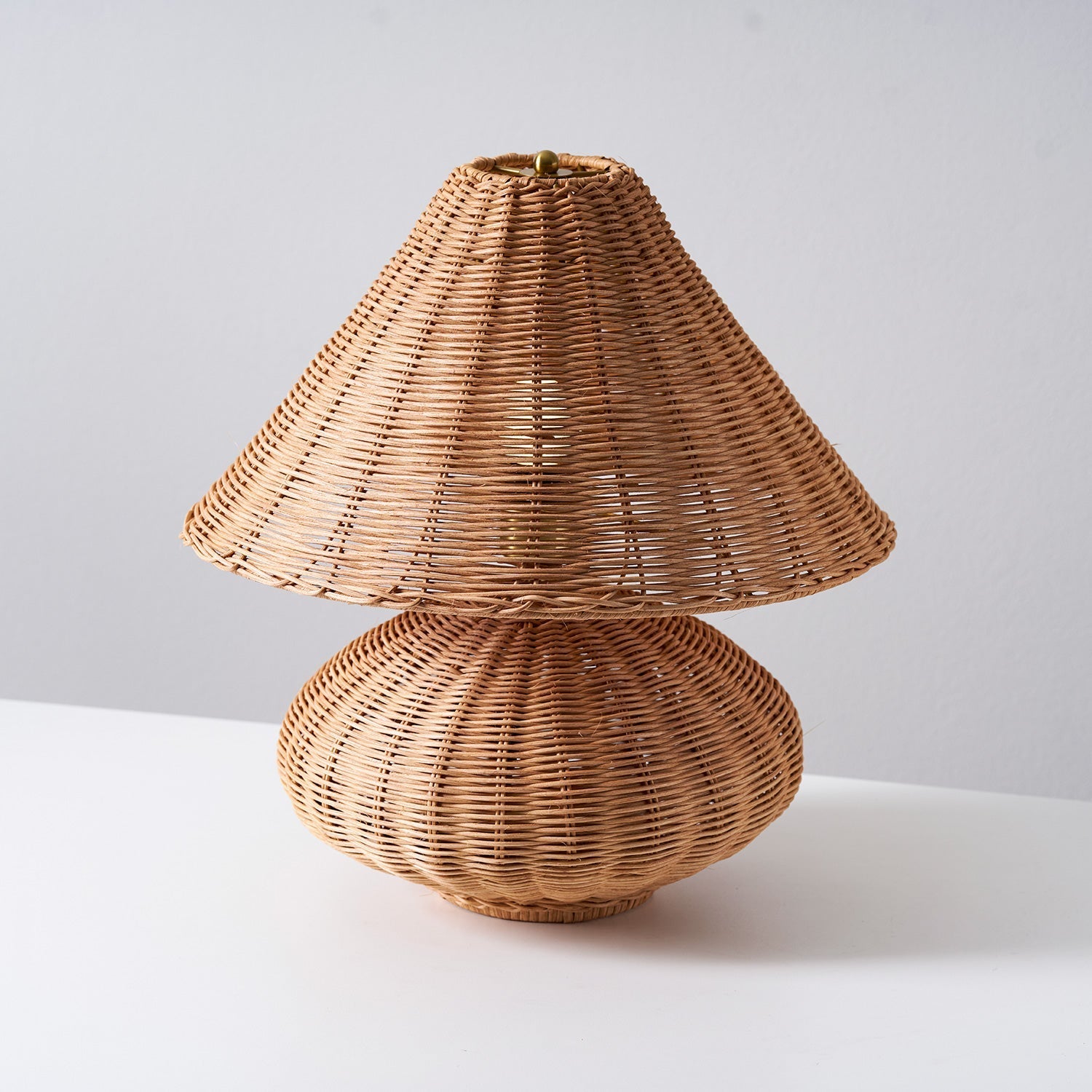 Close-up of the E26/E27 bulb socket inside the rattan shade.