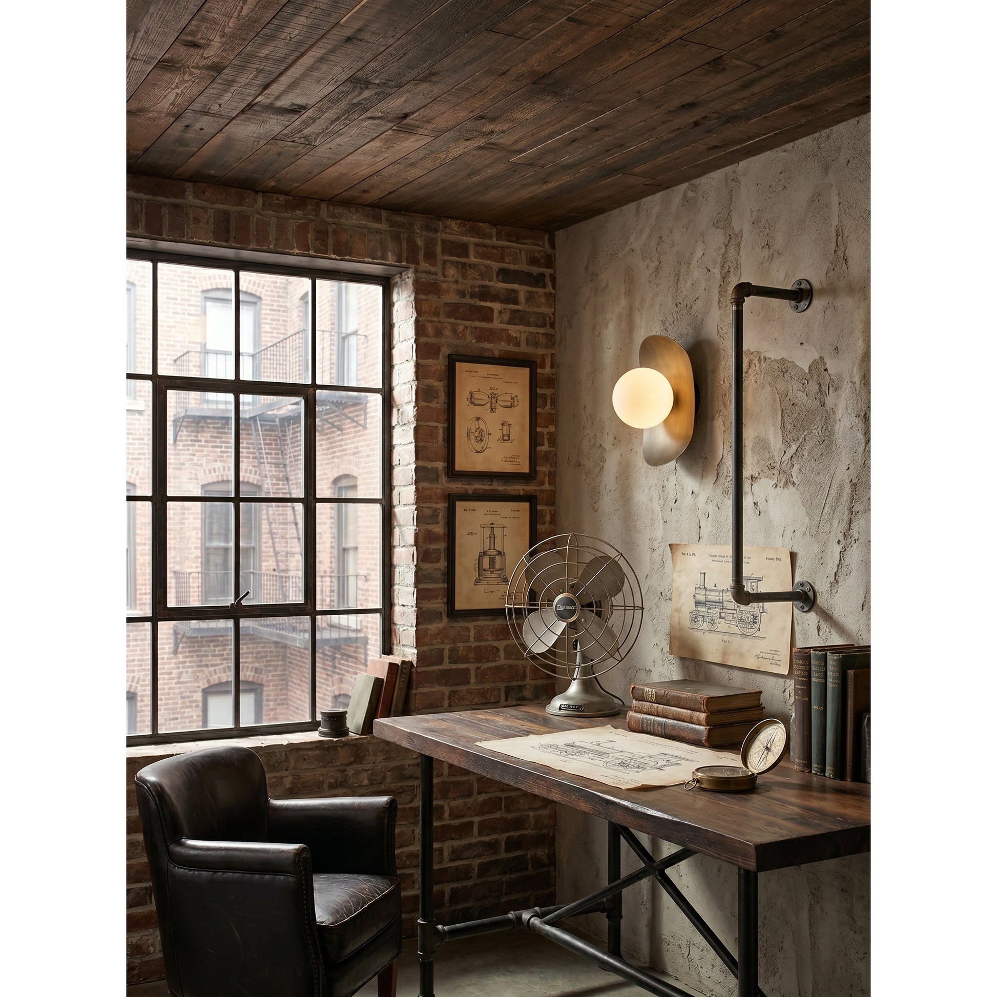 Nouvel Wall Lamp shown in a minimalist living room setting.