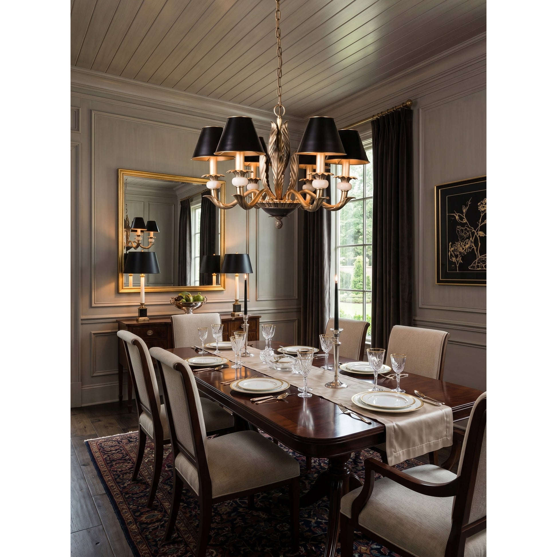 The chandelier illuminated, casting a warm glow in a traditional library setting.