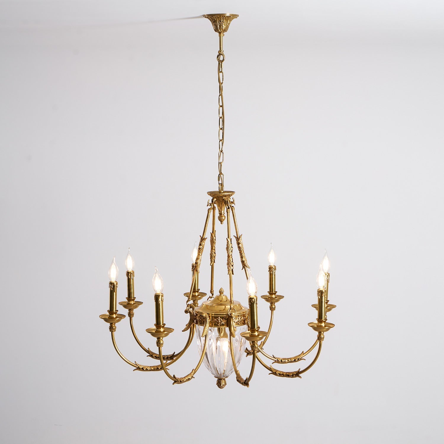 The 8+1 arm version of the Ashford Brass Chandelier in a large formal space.