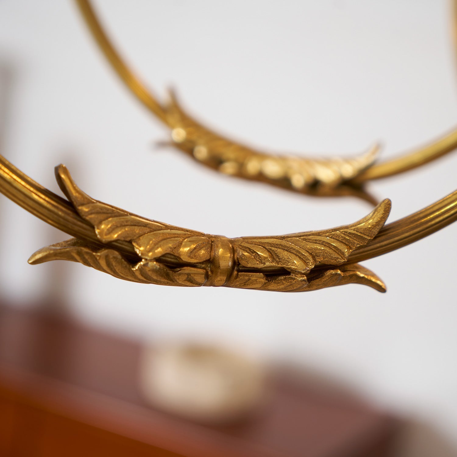 The Ashford Chandelier illuminated, casting a warm, inviting glow.