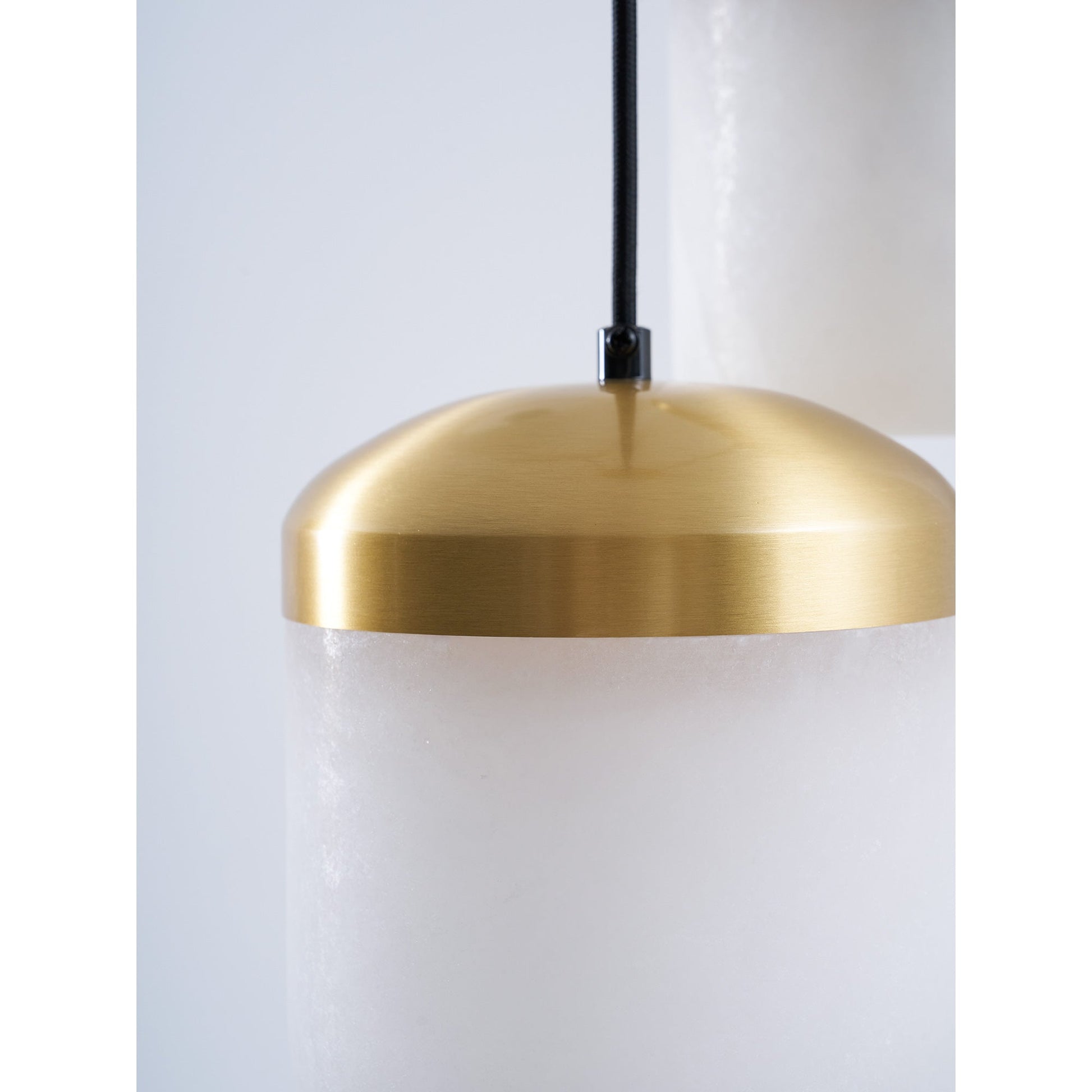 Asta lamp shown with other home decor elements.