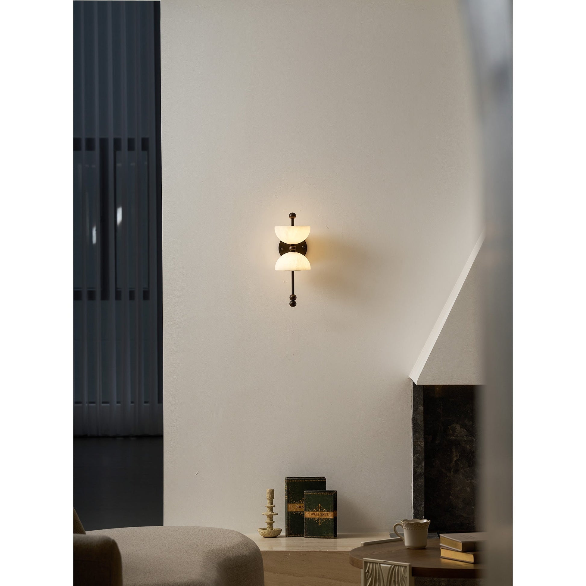 Lyra Wall Lamp mounted on a textured wall.