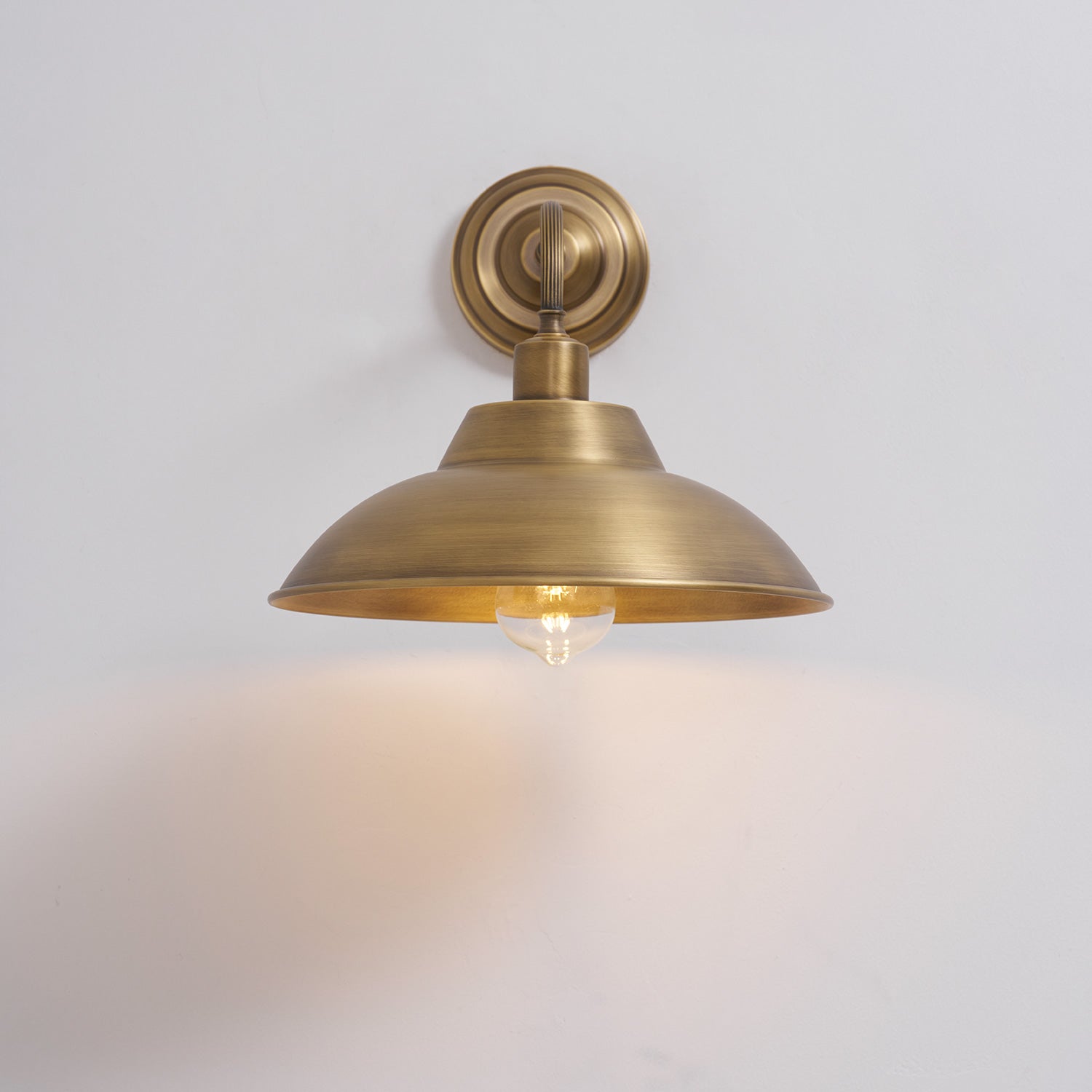 Another angle of the Aldorno Wall Sconce in a living room.