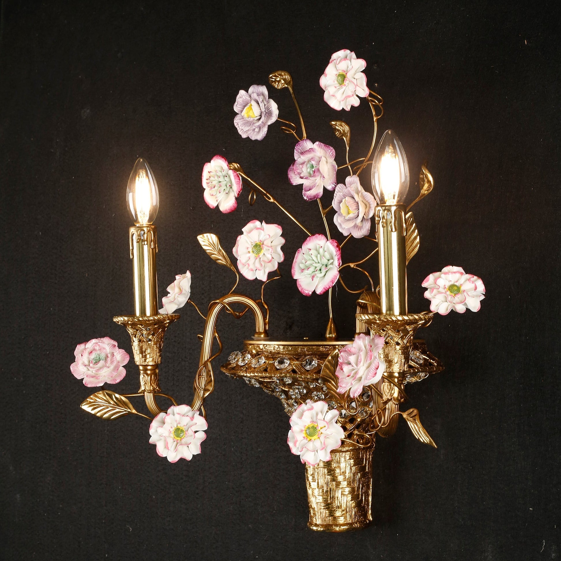 Full product shot of the Tole Ceramic Flower Wall Lamp on a neutral background.
