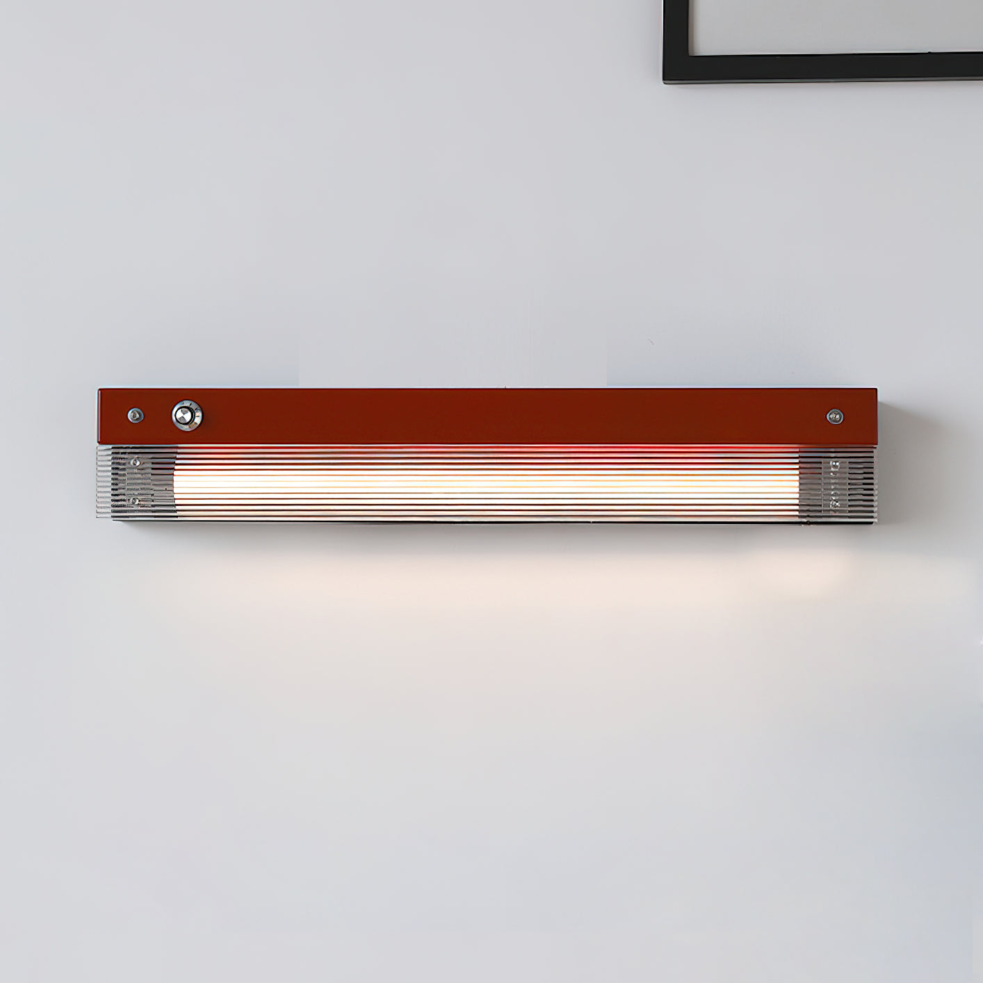 The orange Totem Wall Lamp in a child's playroom.